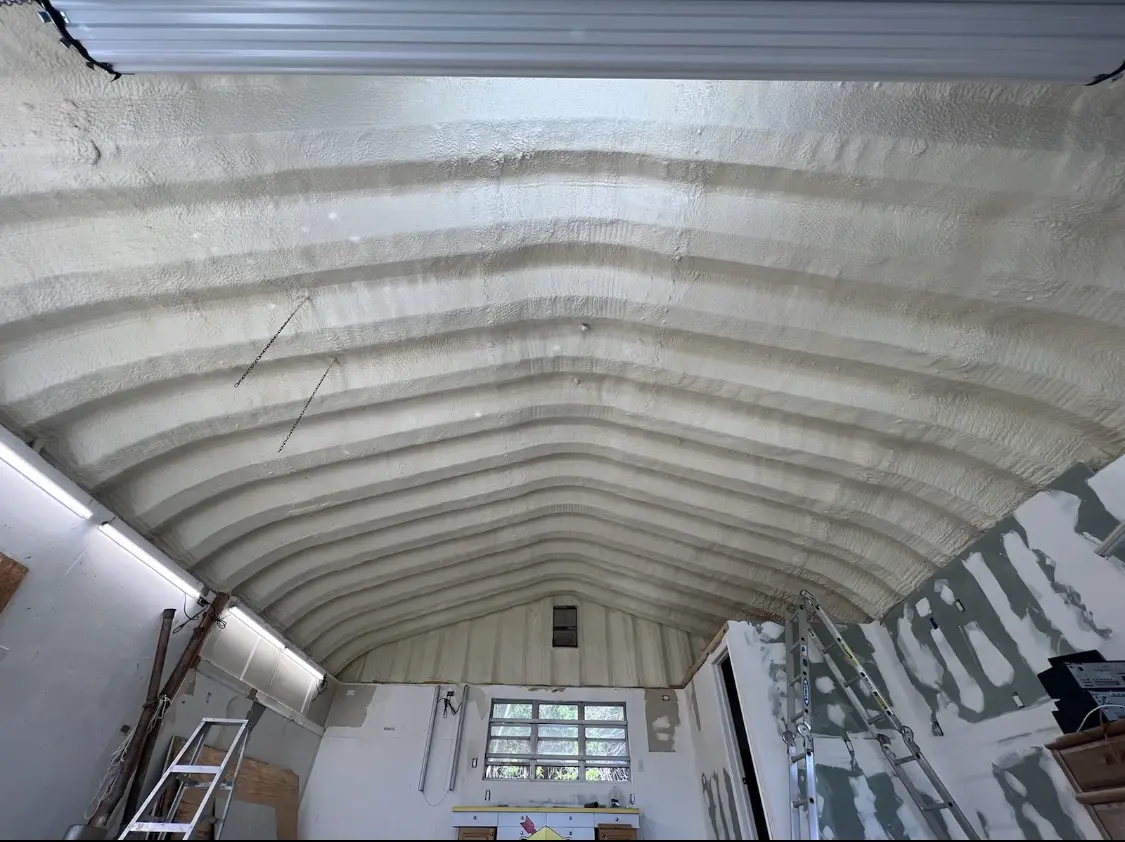 Spray polyurethane foam applied to the underside of a metal roof deck in Hood River